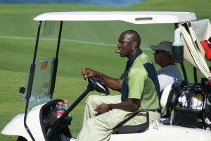Michael Jordan puffing a stogie on the golf course (photo by shgmom56 / CC BY-SA 2.0)