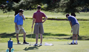 Camaraderie on and off the golf course (photo by Tim Evanson via flickr)
